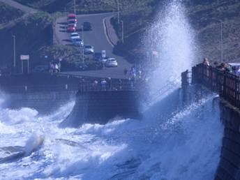 A large wave crashing into a wall

AI-generated content may be incorrect.